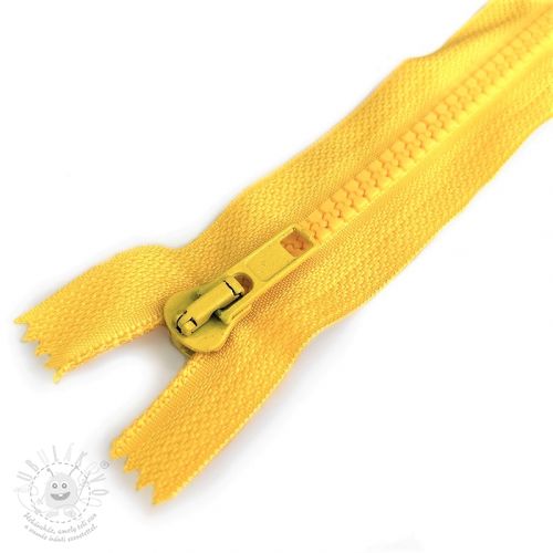 Zip kostěný dělitelný 70 cm yellow